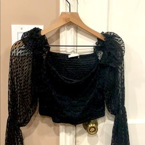 I’m selling a black going out crop top!
